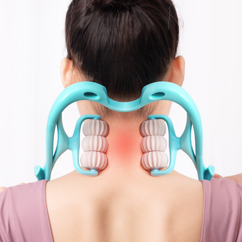 a person with a massager on her neck