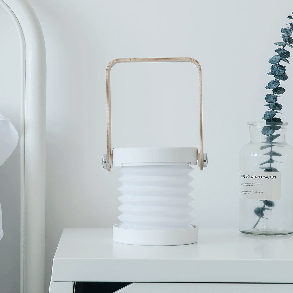 a white lamp on a white table with text: 'BLUE MOUNTAINS CACTUS'