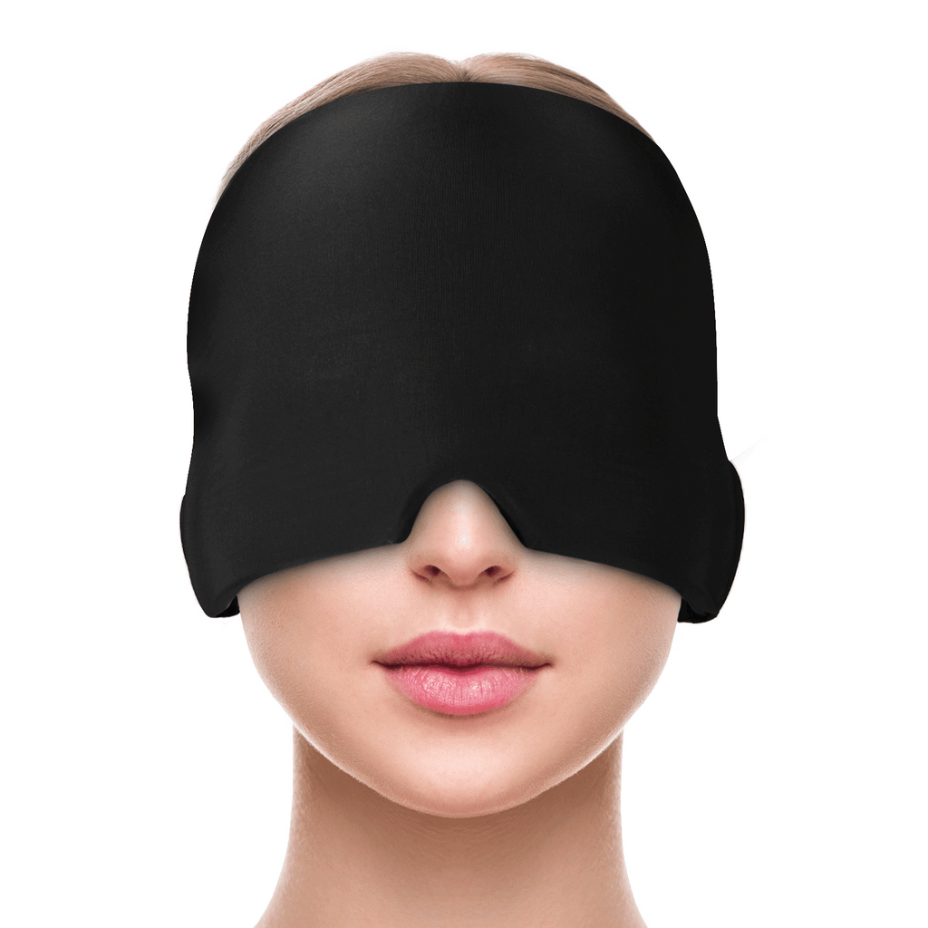 a person wearing a black mask over her eyes