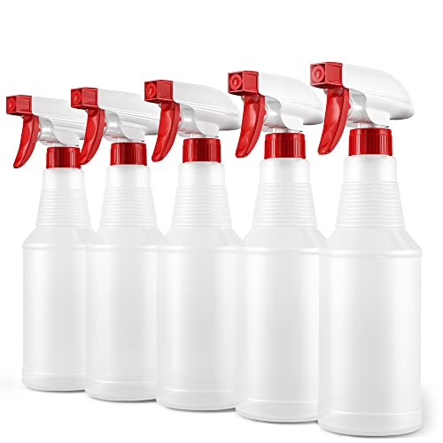 a group of white bottles with red lids